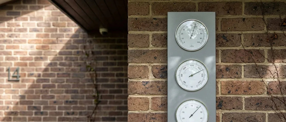 Weather station mounted on a brick wall outside an Australian home