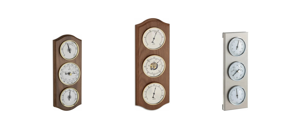 Three analogue weather stations shown to scale