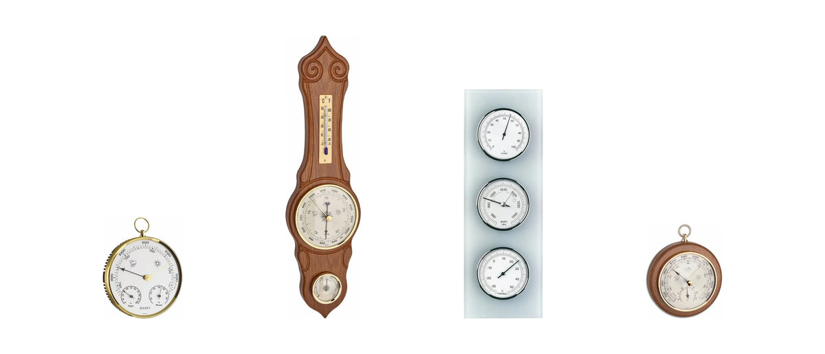 Four analogue weather stations and barometers shown to scale